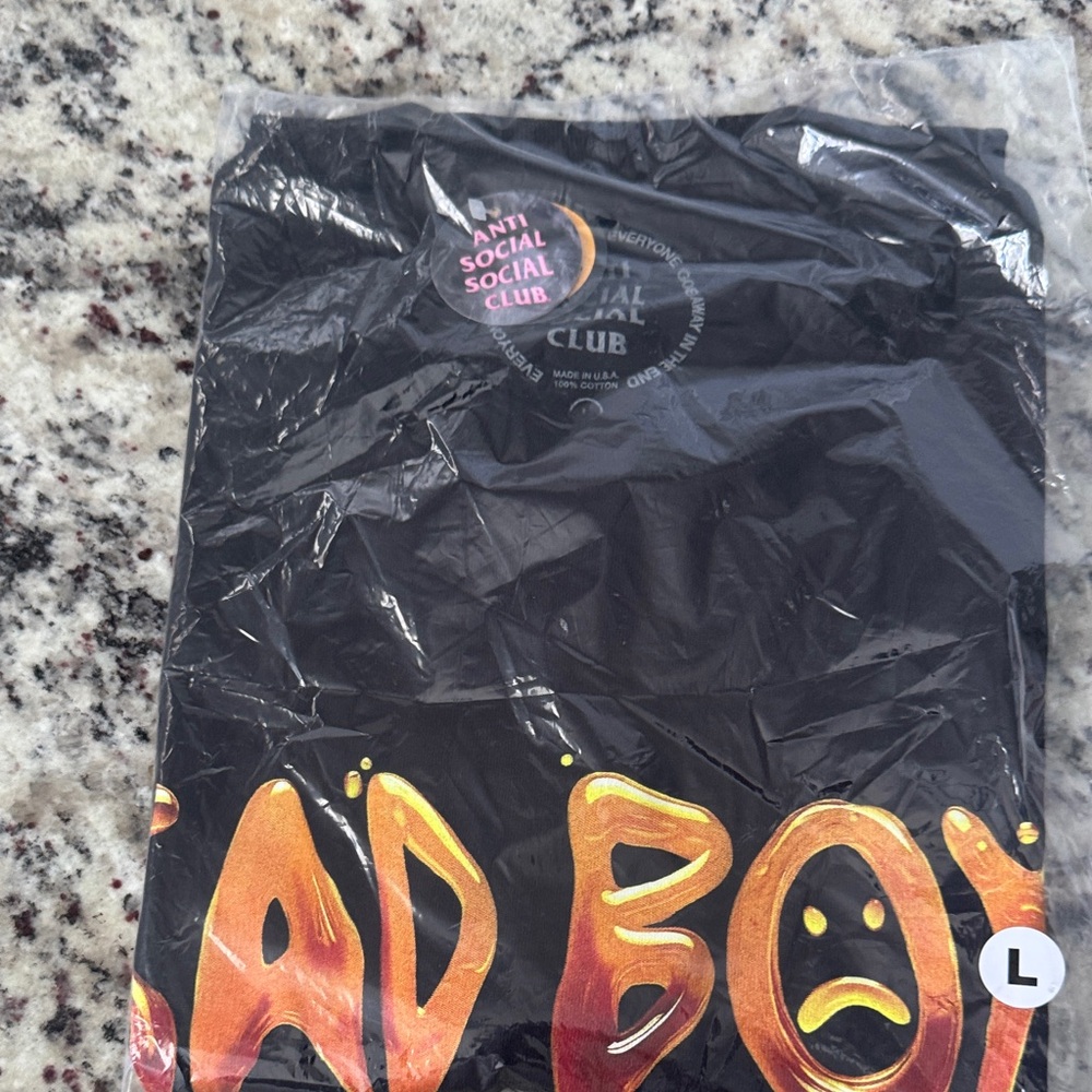 Anti Social Social Club Black Shirt with Fiery Orange Text